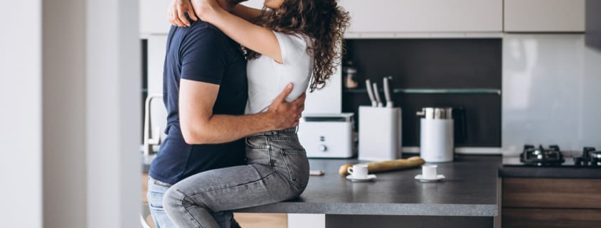 couple in kitchen - newlywed game